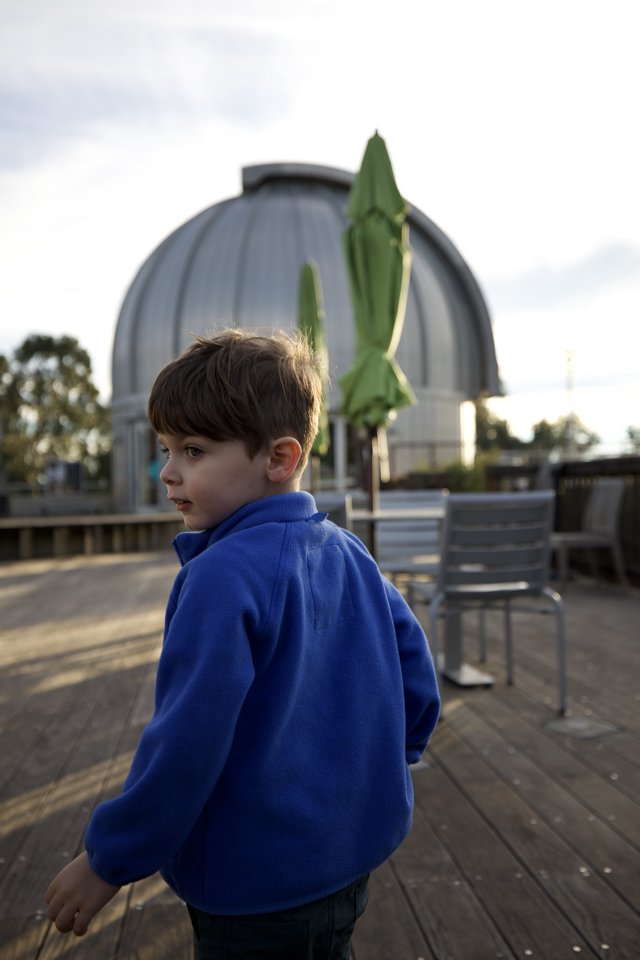 Young Boy at Observatory Deck at Dusk