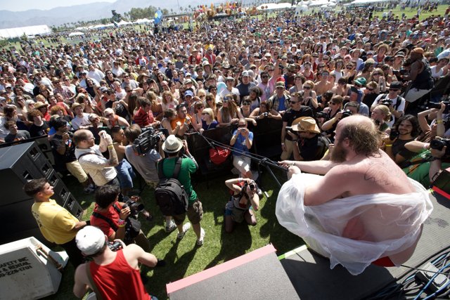 Man in White Shirt Performing at Coachella