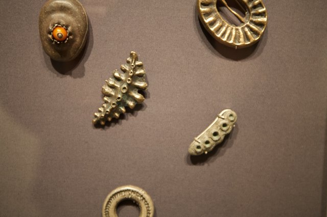 Ancient Metalwork Artifacts and Jewelry Display