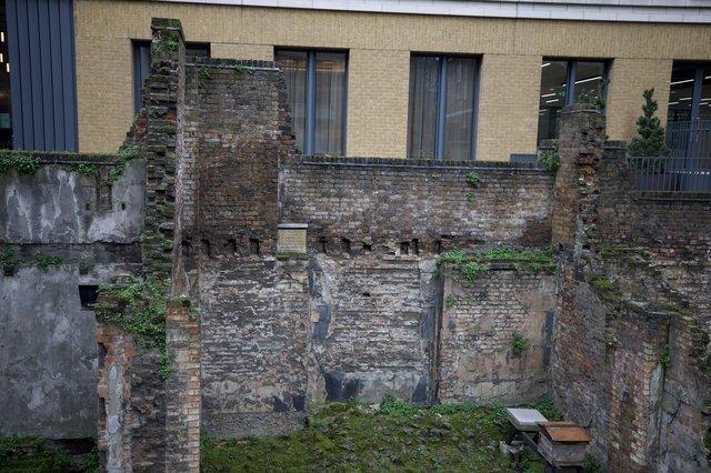Preserved War Ruins Behind Modern London Architecture