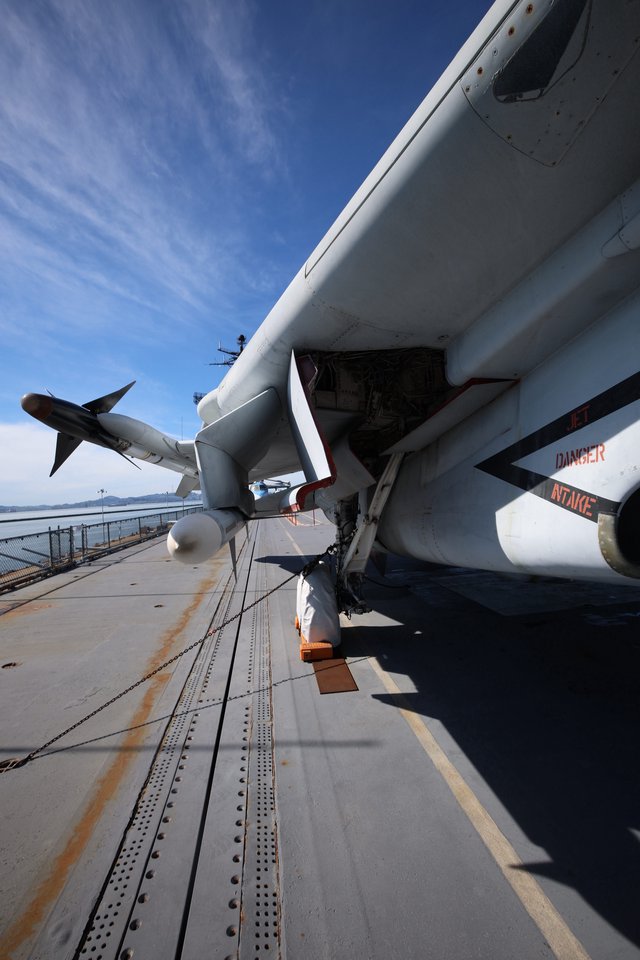 Military Fighter Jet on Aircraft Carrier Deck