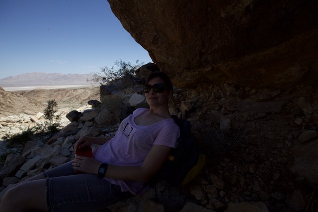 Desert Rest: Sheltering Under Ancient Rock Overhang