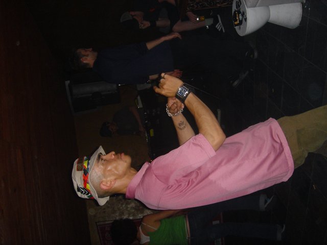 Pink Shirted Man at the Club