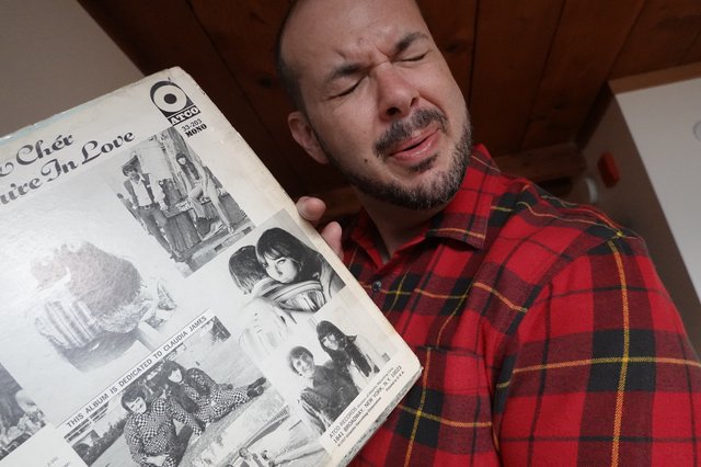 Man Reading Vintage Music Magazine in Flannel
