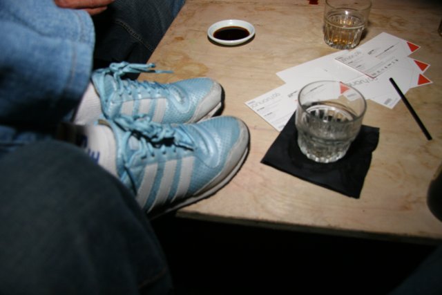 Blue shoes on table