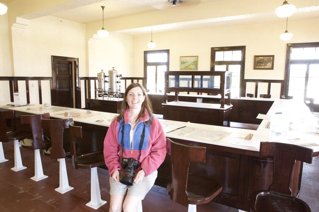 Smiling Photographer Inside Historic Park Visitor Center