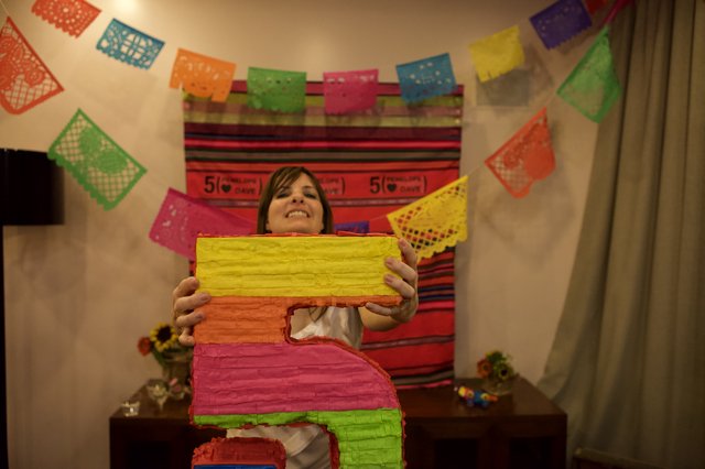 Penelope Celebrates with Colorful Number Five Piñata