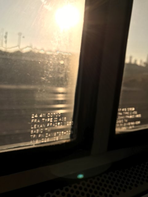 Train Ride With a Window to the Sun