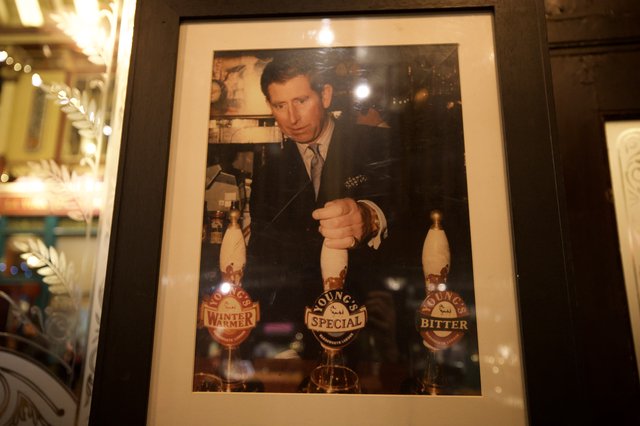 Prince Charles Behind the Bar at British Pub