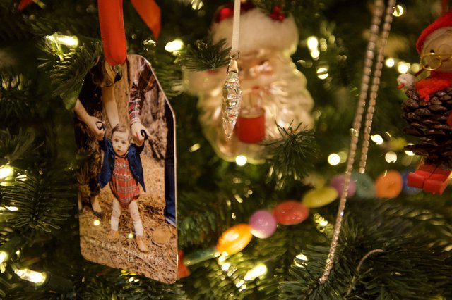 Personalized Photo Ornaments on Illuminated Christmas Tree
