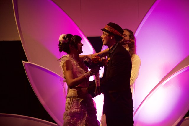 Wedding Dance in Front of a Purple Flower