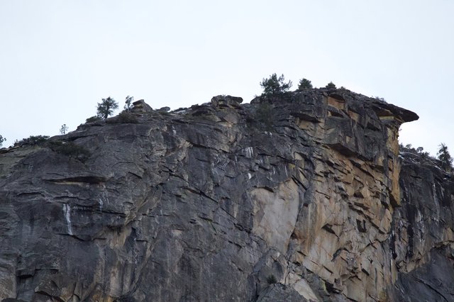 Dramatic Layered Rock Face at Dusk
