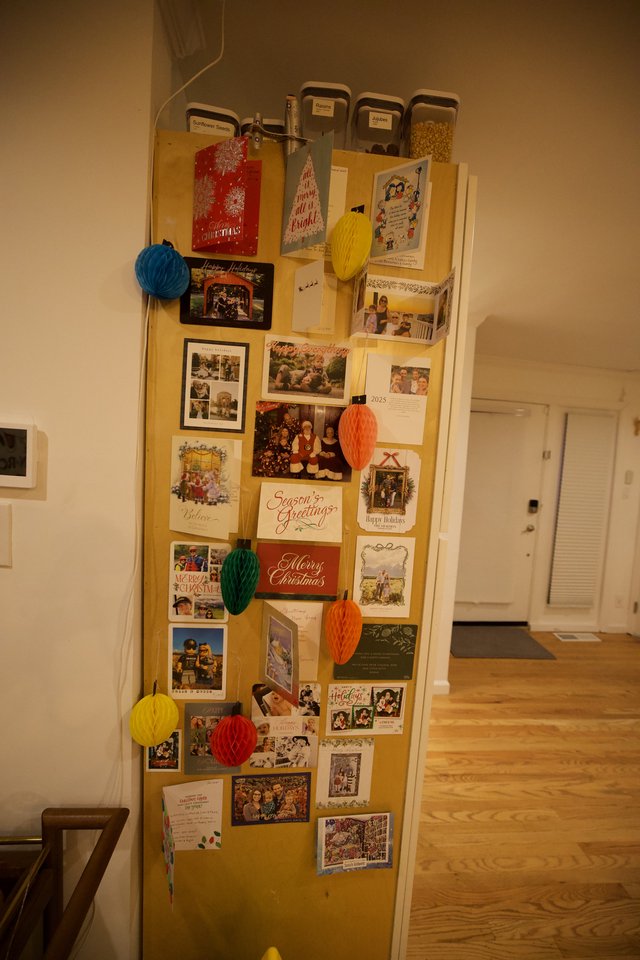 Holiday Card Display Wall with Festive Decorations