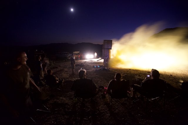 Night Rocket Launch Over the Desert Hill