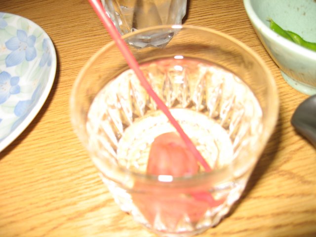 Refreshing Cocktail in a Glass with Straw