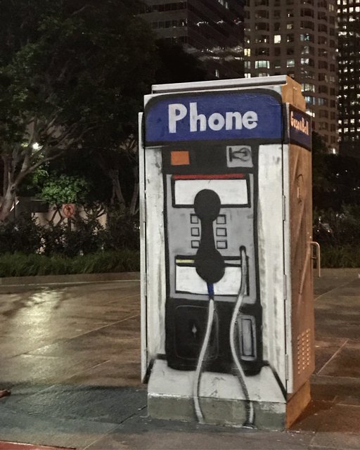 Graffiti-Adorned Phone Booth