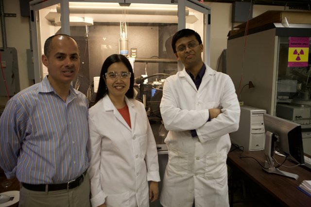 Three Scientists in Lab Coats