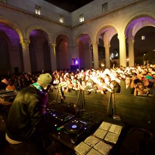 The Night Life in 2008: DJ Fausto Rey playing in front of a crowd