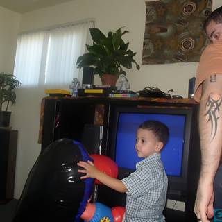 Father and Son Playful Boxing Time