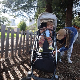 Parent and Child Moment in Park Playground