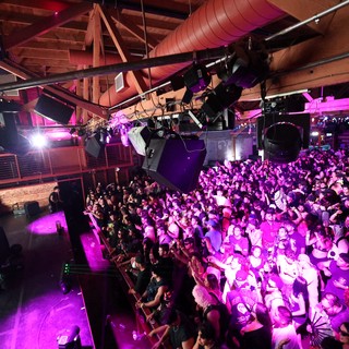 Packed Crowd Pulses Under Purple Lights at Wobbleland