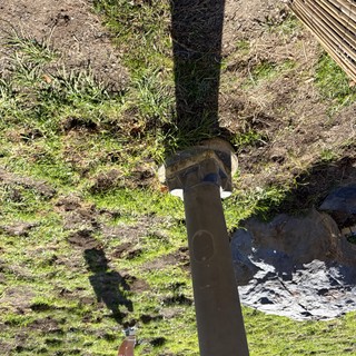 Aerial View of Person Relaxing by Garden Post