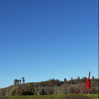 Majestic Red Kite Flying Over Verdant Fields