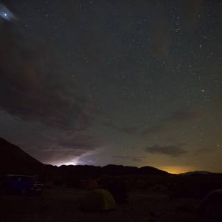 Electrifying Night Camping in the Desert