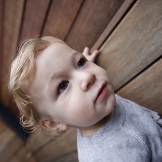 Young Child Looking Up with Wonder and Curiosity