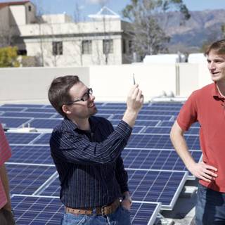 Three Men Harnessing Solar Power
