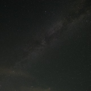 Milky Way Arcs Over Dark Lake Tahoe Sky