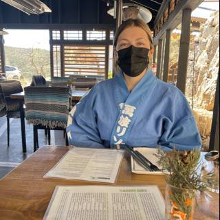 Masked Woman in a Cozy Santa Fe Restaurant