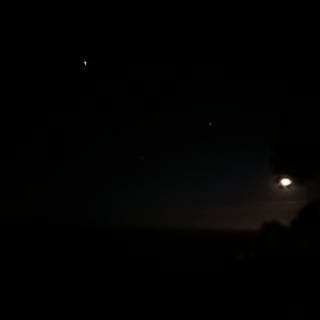 Moon and Venus Meet in the Starry Night Sky
