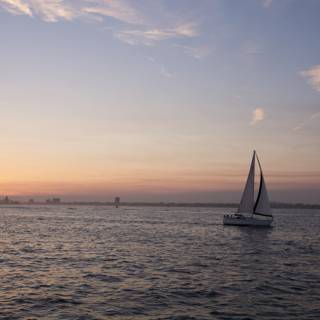 Serene Sailboat at Sunset