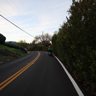 Twilight Cyclist on Rural California Road