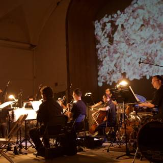 Musical Performance in Front of a Projection Screen