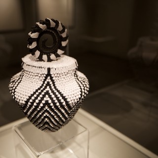 Traditional Native American Beaded Vessel with Geometric Patterns