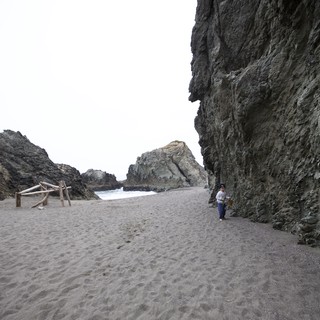 Child Explores Dramatic Coastal Cliffs at Pfeiffer Beach