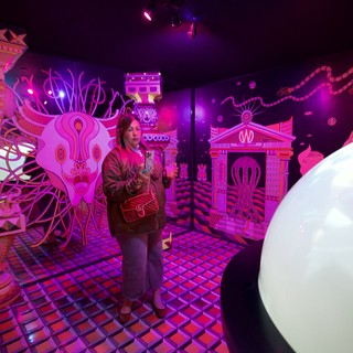 Surreal Art Installation Experience with Neon Pink Lighting