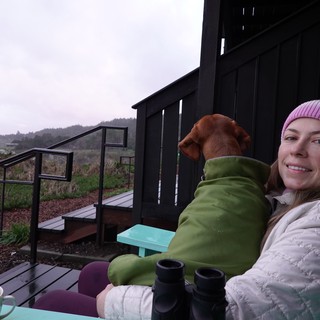 Cozy Morning Coffee with Dog on Coastal Deck