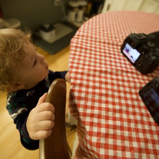 Young Child Participating in Christmas Product Photography Session