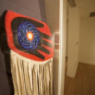 Contemporary Indigenous Textile Art with Spiral Galaxy Motif