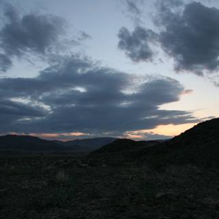 Desert Sunset under the Mysterious Clouds