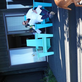 Relaxing on Modern Patio with Turquoise Furniture