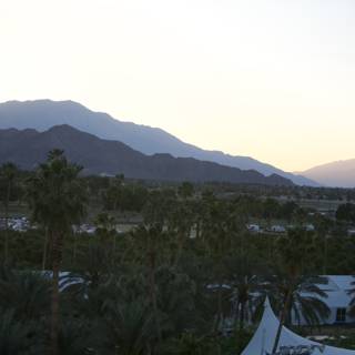 Sunset over the Mountains and Palm Trees