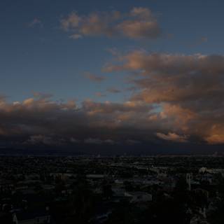 City at Sunset under Cumulus Clouds