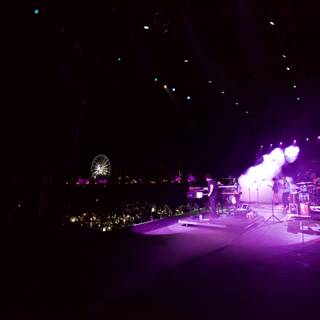 Nighttime Rock Concert Under Purple Lights