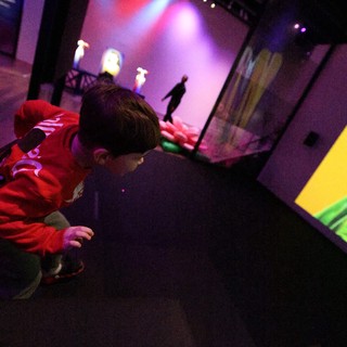 Child in Red Hoodie at Baby Rave Event