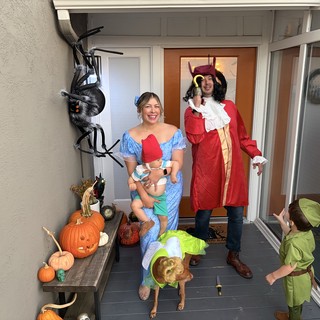 Family Peter Pan Halloween Costumes on Front Porch