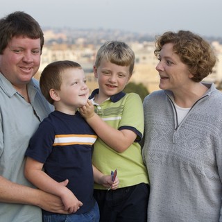 Family Portrait on City Overlook at Dusk
